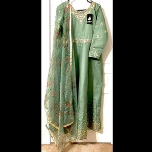 Light green lengha / gown, with floral dupatta, and intricate sequin work